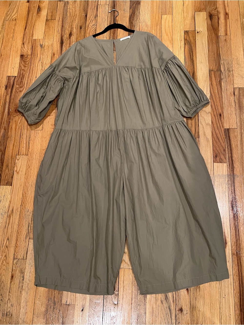 black crane size small clay puff jumpsuit oversized